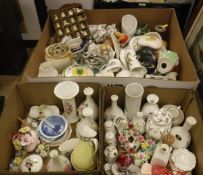 A selection of various china wares to include a Poole figure of a seated bear,