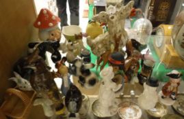 A large collection of various Goebel figures including mushroom, Scottie dog with brolly,