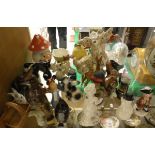 A large collection of various Goebel figures including mushroom, Scottie dog with brolly,