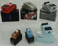 A collection of various effects pedals, including a Marshall ED-1 Edward The Compressor,
