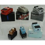 A collection of various effects pedals, including a Marshall ED-1 Edward The Compressor,