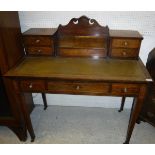 A circa 1900 rosewood and marquetry inlaid ladies writing table by James Shoolbred & Co.