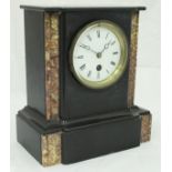 A late Victorian black marble and variegated Rosso marble inlaid cased mantle clock,