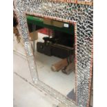 A mosaic mirror framed rectangular wall mirror with bevel edged plated by Debbie Sterling of
