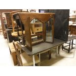 An oak oval gate-leg drop-leaf dining table, glass topped two tier coffee table,