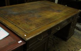 A 20th Century oak partner's desk,