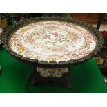 A Chinese famille-rose tazza, the centre field decorated with figures, one smoking a pipe,