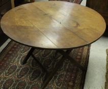 A Victorian oak coaching table in the manner of Thornton & Hearne