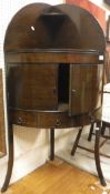 A 19th Century mahogany bow fronted corner washstand,