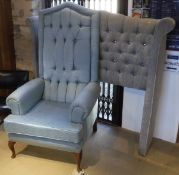 A 20th Century blue buttoned upholstered scroll arm throne chair on cabriole legs to pad feet and a