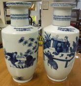 A pair of 19th Century Chinese blue and white Roulade vases,