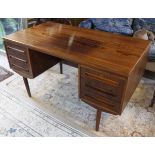 A mid 20th Century Danish rosewood desk by J Svenstrup for A P Mobler (Cert No.