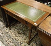 A circa 1900 mahogany single drawer writing table with tooled and gilded leather insert top