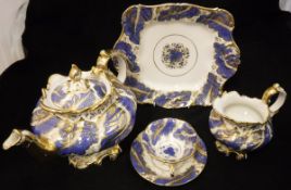 A 19th Century Rockingham style tea set, blue and gilt decorated, comprising teapot, cream jug,