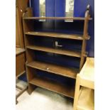 A stained pine five tier open book shelf in the Arts and Crafts style