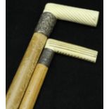 A Victorian ivory handled malacca walking cane with silver ferrule,