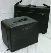 Two green leather suitcases marked Asprey of London
