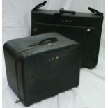 Two green leather suitcases marked Asprey of London