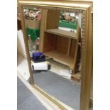 A large rectangular gilt framed wall mirror