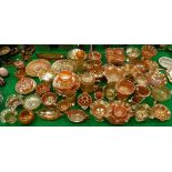 A large quantity of various carnival glass ware, including bowls, dishes, vases,