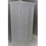 A modern painted pine two door wardrobe with panelled doors CONDITION REPORTS Max