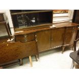 A Minty oak five section stacking bookcase with sliding doors,