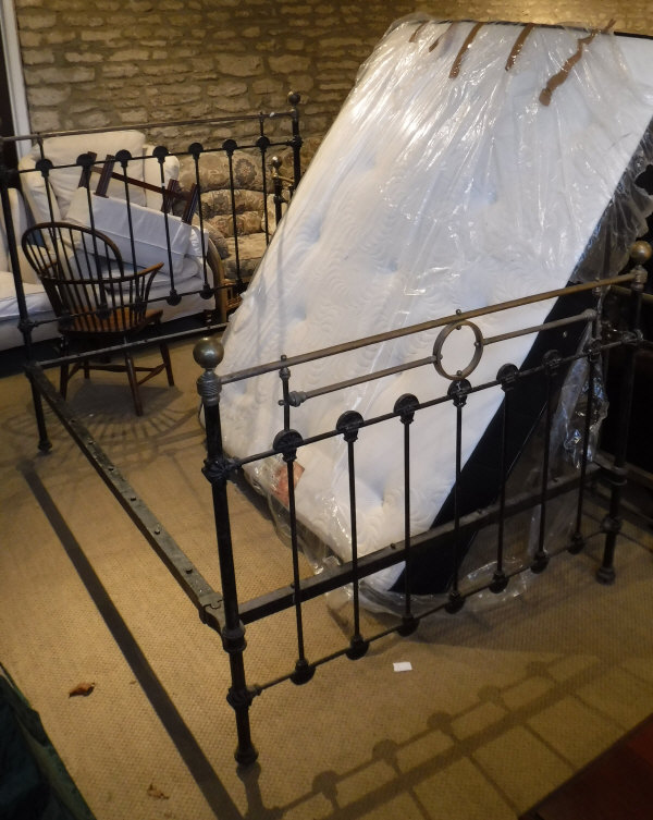 A Victorian brass and iron double bedstead with Comfy Night memory foam orthopaedic mattress