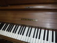 A Henry Riley mahogany cased upright piano CONDITION REPORTS Appears to be in