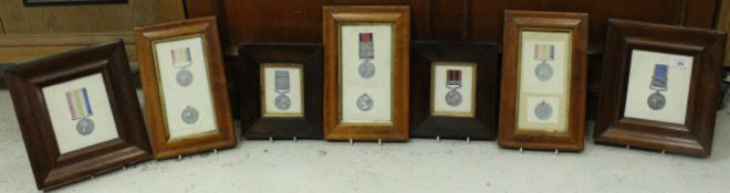 A collection of seven framed and glazed hand-painted studies of medals including Crimea medal,