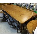A modern pine farmhouse style kitchen table on turned legs