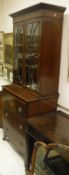 A 20th Century mahogany and inlaid secretaire bookcase in the Regency style CONDITION