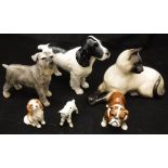 A Beswick figure of a spaniel, a Beswick figure of a schnauzer,