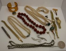 A box of assorted costume jewellery, buttons, etc,