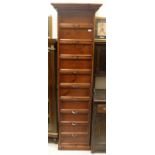 A modern stained pine haberdasher's style chest of ten drawers CONDITION REPORTS 222