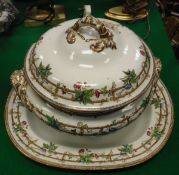 A Copeland lidded tureen and a serving plate decorated with armorial amongst flowers on vine on