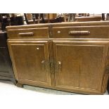 A 1930's oak sideboard