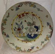 A late 17th / early 18th Century Dutch polychrome Delft charger,