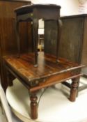 An Eastern hardwood and studded coffee table, an oval occasional table,