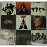 A box of various LPs to include The Beatles "Help!" (mono), "Abbey Road", "Love Songs",