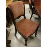 A set of six Victorian mahogany framed upholstered dining chairs
