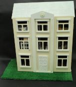 A modern painted dolls's house in the Georgian style,