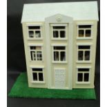 A modern painted dolls's house in the Georgian style,