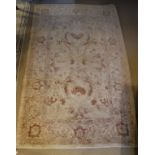 A Persian style rug,