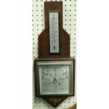 A 1930's oak cased barometer / thermometer in the Art Deco style and a Regency rosewood sarcophagus