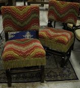 A set of ten 1920's oak framed dining chairs in the 17th Century manner with upholstered backs and