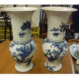A matched pair of blue and white Chinese baluster shaped vases with flared rims,