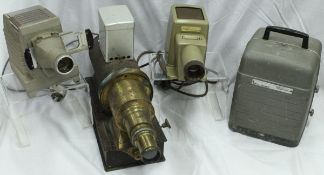 A Bell & Howell Auto Load projector, magic lantern, Kodak Koda slide projector,