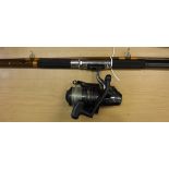 A Steade-Fast two piece beach-casting rod,