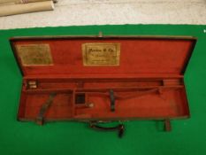 A leather mounted and canvas covered motor case by Manton & Co.