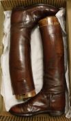 A pair of gentlemen's brown hunting boots with wooden trees,